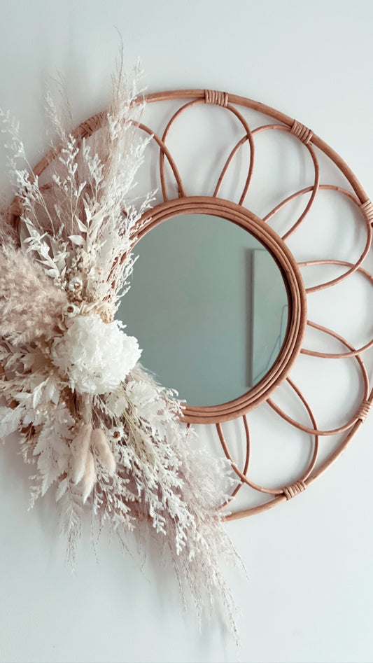 Rattan mirror with dried flowers